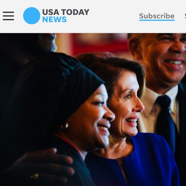 Three people, including Nancy Pelosi, smiling and looking to the right, with a man in the background.